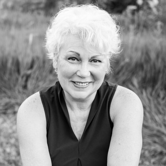 Black and white headshot of Owner & Agent, Terri Milbank